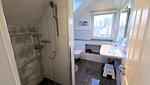 Badezimmer - Ferienhaus "Marie II" ostseenah im Ferienpark Holm - Top-Hundeurlaub
