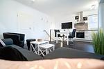 Wohnzimmer - Ferienwohnung "Strandhaus Möwenberg App. 11" - Top-Hundeurlaub