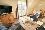Wohnbereich mit Zugang zum Südbalkon - Holiday 2 - Top-Hundeurlaub