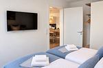 Schlafzimmer mit TV und Meerblick - Meerblick (50.4.N) - Top-Hundeurlaub