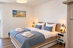 Schlafzimmer 2 mit TV - Meerblick (50.4.N) - Top-Hundeurlaub