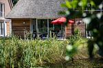 Terrasse vom See - SmartFewo: Nebelgruß | Seeterrasse | Sauna | Park - Top-Hundeurlaub