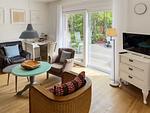 Wohnzimmer - Ferienhaus *Koggenhüs* - Top-Hundeurlaub