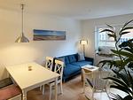 Essbereich im Wohnzimmer der Ferienwohnung Strandlöper in Wittdün auf Amrum - Ferienwohnung *Strandlöper* - Top-Hundeurlaub