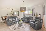Wohnzimmer - Ferienhaus Zirchow 3 mit 3 Schlafzimmern, Kamin und Terrasse - Top-Hundeurlaub