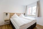 Schlafzimmer - Maisonette-Apartment „Hafenparadies“ am Yachthafen , optional mit Bootsliegeplatz gegen Gebühr .Haus 6 Nr47 - Top-Hundeurlaub