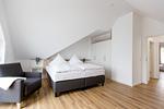 Schlafzimmer - Maisonette-Apartment „Hafenparadies“ am Yachthafen , optional mit Bootsliegeplatz gegen Gebühr .Haus 6 Nr47 - Top-Hundeurlaub