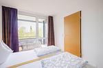 Schlafzimmer - Zwei-Zimmer-Apartment 49/20 - Top-Hundeurlaub