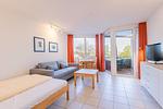 Wohnzimmer - Ein-Zimmer-Apartment 49/25 - Top-Hundeurlaub