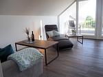 Wohnzimmer - Haus Nr. 35, Ferienhaus Fischerhus - Top-Hundeurlaub