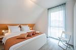 Schlafzimmer - Ferienhaus Abendrot OG ruhige Lade mit Balkon und Parkplatz - Top-Hundeurlaub