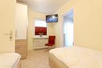 Schlafzimmer - Atriumhaus 24a - Top-Hundeurlaub