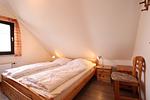 Schlafzimmer - DHH Meisenweg 14 Vroni - Top-Hundeurlaub