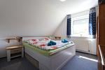 Schlafzimmer - Haus Kruse-Puck OG - Top-Hundeurlaub