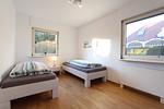 Schlafzimmer - Haus Meisenweg 5 - Top-Hundeurlaub