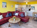 Wohnzimmer der Ferienwohnung "Willkommen bei den Hartmanns" in Wittdün auf Amrum - Ferienwohnung „Willkommen bei den Hartmanns" - Top-Hundeurlaub