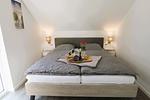 Schlafzimmer - Haus Nr. 19, Ferienhaus Fischerhus - Top-Hundeurlaub