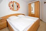 Schlafzimmer - FeWo 15: Balkon, Meerblick - Top-Hundeurlaub