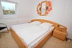 Schlafzimmer - FeWo 15: Balkon, Meerblick - Top-Hundeurlaub