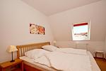 Schlafzimmer - FeWo 01: Balkon, Meerblick - Top-Hundeurlaub