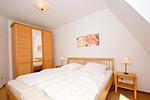 Schlafzimmer - FeWo 01: Balkon, Meerblick - Top-Hundeurlaub