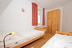 Schlafzimmer - FeWo 01: Balkon, Meerblick - Top-Hundeurlaub