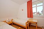 Schlafzimmer - FeWo 01: Balkon, Meerblick - Top-Hundeurlaub