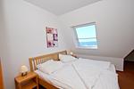 Schlafzimmer - FeWo 06:  Balkon, Meerblick - Top-Hundeurlaub