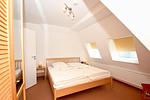 Schlafzimmer - FeWo 05: Balkon, Meerblick - Top-Hundeurlaub