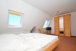 Schlafzimmer - FeWo 05: Balkon, Meerblick - Top-Hundeurlaub