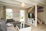 Wohnzimmer - Haus: Terrasse, Balkon, eigene Sauna, Sauna - und Schwimmbadnutzung - Top-Hundeurlaub