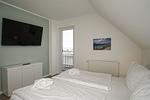 Schlafzimmer - Haus: Terrasse, Balkon, eigene Sauna, Sauna - und Schwimmbadnutzung - Top-Hundeurlaub