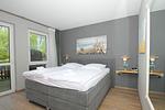 Schlafzimmer - FeWo09:Strand,Terr.,Pool,Sauna - Top-Hundeurlaub