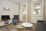 Wohnzimmer - FeWo 01: Veranda, Sauna, Schwimmbad - Top-Hundeurlaub