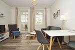 Wohnzimmer - FeWo 01: Veranda, Sauna, Schwimmbad - Top-Hundeurlaub