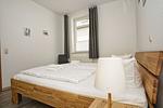 Schlafzimmer - FeWo 01: Veranda, Sauna, Schwimmbad - Top-Hundeurlaub
