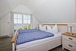 Schlafzimmer - FeWo1: Meerblick, Terr, Garten - Top-Hundeurlaub
