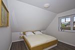 Schlafzimmer - FeWoOG: Balkon, Meerblick - Top-Hundeurlaub