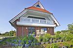 Fassade / Eingang - FeWoOG: Balkon, Meerblick - Top-Hundeurlaub