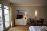 Wohnzimmer - FeWo30: Terrasse, Sauna, Schwimmbad - Top-Hundeurlaub