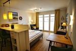 Wohnzimmer - FeWo30: Terrasse, Sauna, Schwimmbad - Top-Hundeurlaub