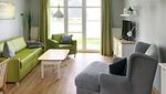 Wohnzimmer - FeWo10: Terrasse, Sauna, Schwimmbad - Top-Hundeurlaub