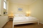 Schlafzimmer - FeWo43: Terrasse, Sauna, Schwimmbad - Top-Hundeurlaub