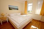 Schlafzimmer - FeWo44: Terrasse, Sauna, Schwimmbad - Top-Hundeurlaub