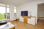 Wohnzimmer - FeWo11: Terrasse, Sauna, Schwimmbad - Top-Hundeurlaub