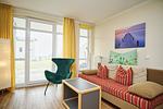 Wohnzimmer - FeWo19: Terrasse, Sauna, Schwimmbad - Top-Hundeurlaub
