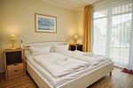 Schlafzimmer - FeWo19: Terrasse, Sauna, Schwimmbad - Top-Hundeurlaub