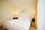 Schlafzimmer - FeWo19: Terrasse, Sauna, Schwimmbad - Top-Hundeurlaub