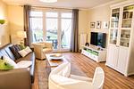 Wohnzimmer - FeWo12: Terrasse, Sauna, Schwimmbad - Top-Hundeurlaub