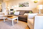 Wohnzimmer - FeWo12: Terrasse, Sauna, Schwimmbad - Top-Hundeurlaub